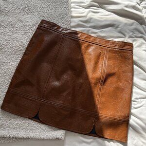 5. Skies Are Blue Faux Leather Scallop Hem Mini Skirt